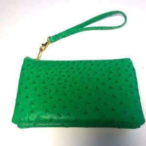 WRISTLET /CLUTCH /SMALL WALLET PURSE TONS OF POCKETS/STORAGE FOR A SMALL BAG
